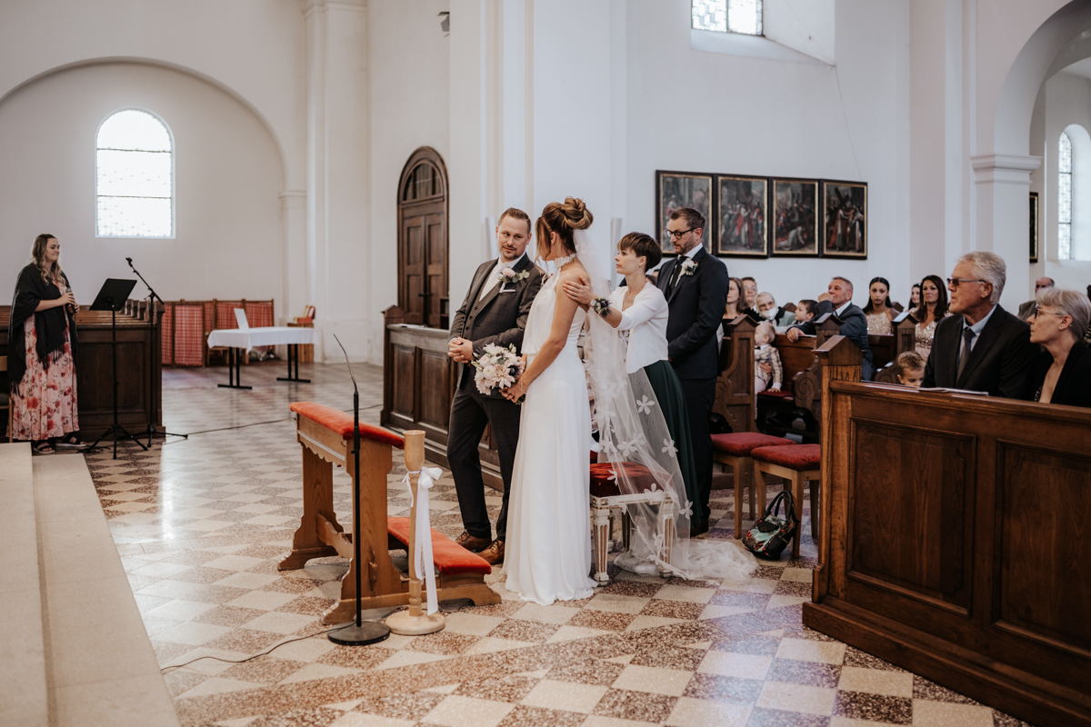 Foto einer kirchlichen Trauung bei einer Hochzeit in Ebensee, von Fotograf Kosia